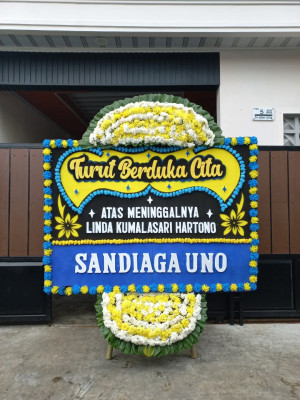 Papan Bunga Duka di Pasar Usang